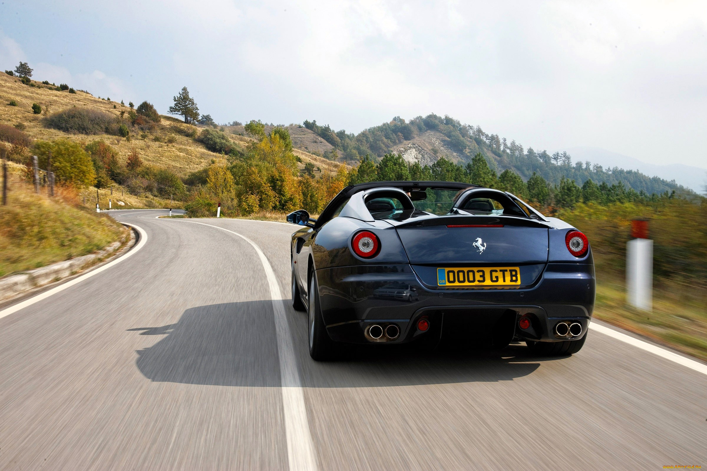 автомобили, ferrari, черный, скорость, дорога, шоссе, горы, деревья