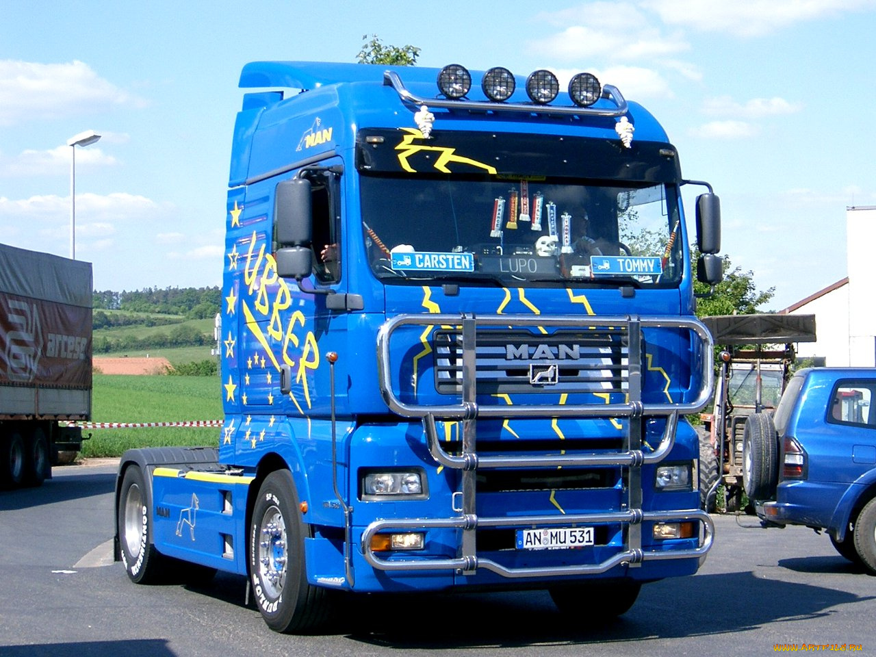 автомобили, man