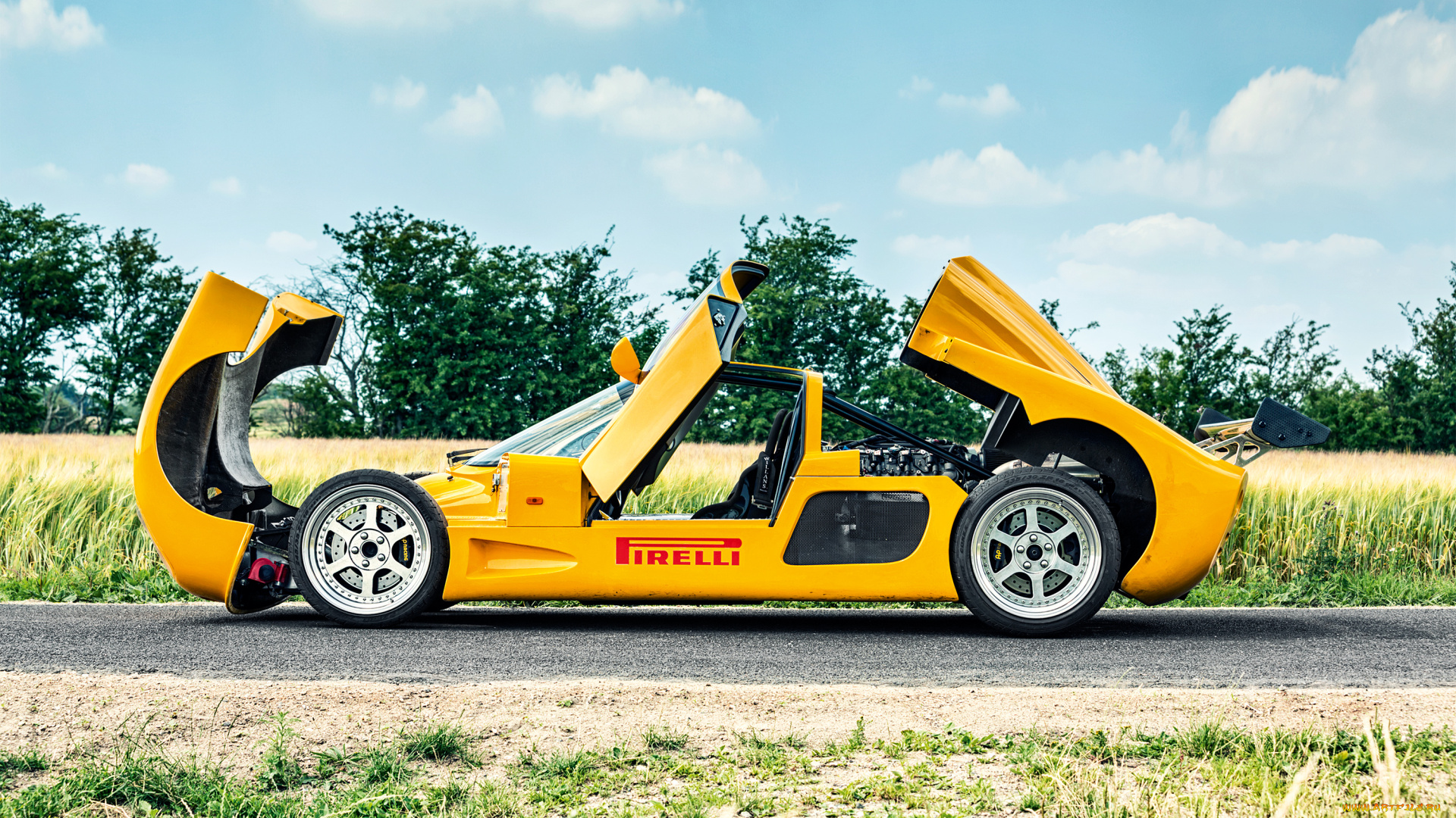 автомобили, ultima