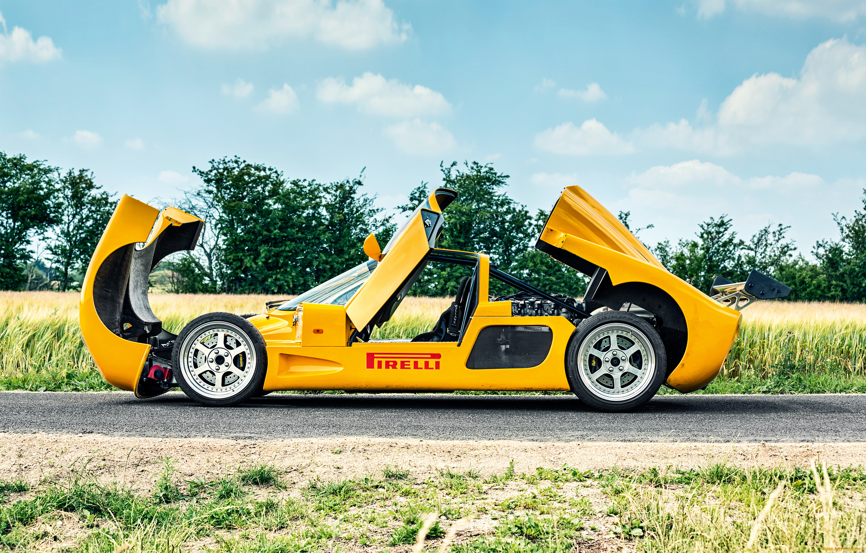 автомобили, ultima